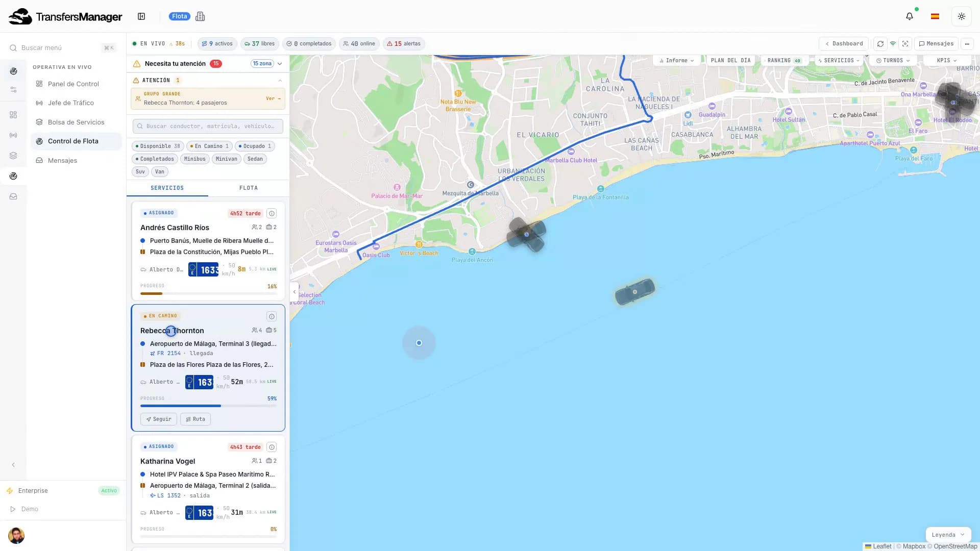 TransfersManager fleet control (in Spanish): a live map of Malaga by the airport with one car selected, its driver busy at 62 km/h, plate 7220 NCJ, the route drawn and the active job card with the passenger and the pickup
